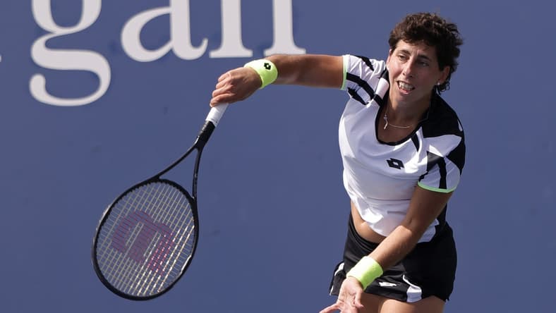Aug 30, 2021; Flushing, NY, USA; Carla Suarez Navarro (ESP) serves against Danielle Collins (USA)(not pictured) on day one of the 2021 U.S. Open tennis tournament at USTA Billie King National Tennis Center. Mandatory Credit: Geoff Burke-USA TODAY Sports