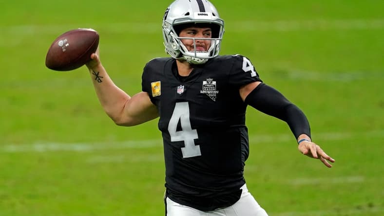 Nov 15, 2020; Paradise, Nevada, USA; Las Vegas Raiders quarterback Derek Carr (4) looks to pass against the Denver Broncos during the first half at Allegiant Stadium. Mandatory Credit: Kirby Lee-USA TODAY Sports