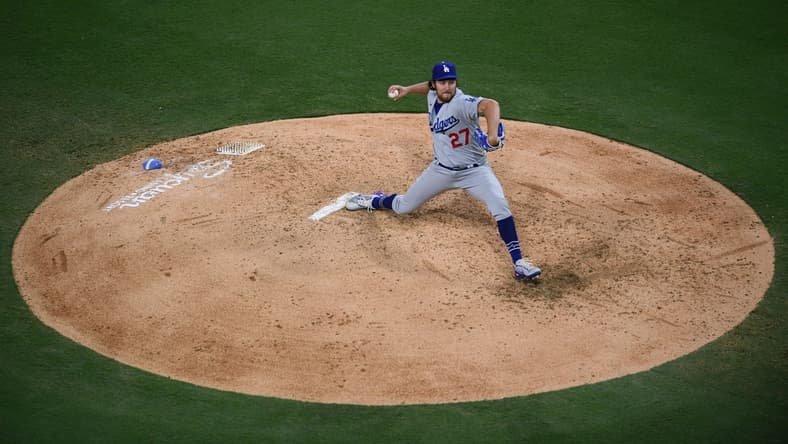 Jun 23, 2021; San Diego, California, USA; Los Angeles Dodgers starting pitcher Trevor Bauer (27) throws a pitch against the San Diego Padres during the fourth inning at Petco Park. Mandatory Credit: Orlando Ramirez-USA TODAY Sports
