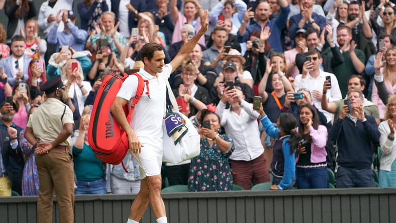 Jul 7, 2021; London, United Kingdom; Roger Federer (SUI) waving farewell to the Centre Court fans after losing to Hubert Hurkacz (POL) in the quarter finals at All England Lawn Tennis and Croquet Club. Mandatory Credit: Peter van den Berg-USA TODAY Sports
