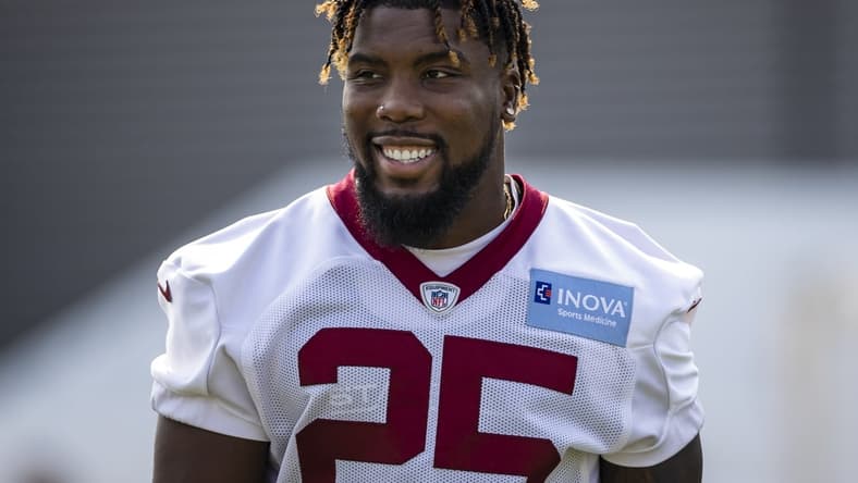 Jul 29, 2021; Richmond, VA, USA; Washington Football Team running back Peyton Barber (25) looks on during training camp at Bon Secours Washington Redskins Training Cennter. Mandatory Credit: Scott Taetsch-USA TODAY Sports
