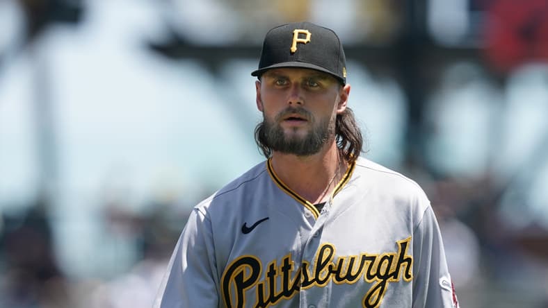 Jul 25, 2021; San Francisco, California, USA; Pittsburgh Pirates starting pitcher JT Brubaker (34) walks to the dugout before the game against the San Francisco Giants at Oracle Park. Mandatory Credit: Darren Yamashita-USA TODAY Sports