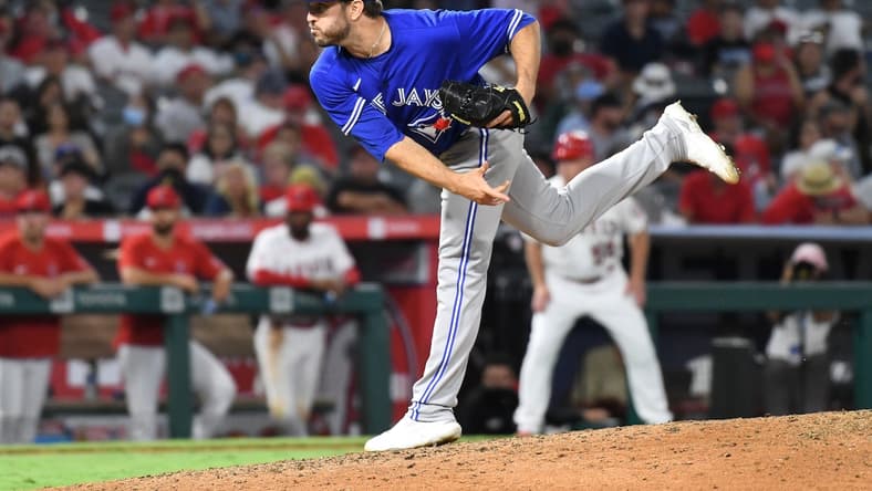 Aug 12, 2021; Anaheim, California, USA; Toronto Blue Jays relief pitcher Connor Overton (44) works the mound in the eighth inning against the Los Angeles Angels at Angel Stadium. Mandatory Credit: Richard Mackson-USA TODAY Sports