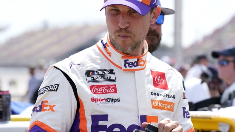 Aug 22, 2021; Brooklyn, Michigan, USA; NASCAR Cup Series driver Denny Hamlin (11) before the FireKeepers Casino 400 at Michigan International Speedway. Mandatory Credit: Mike Dinovo-USA TODAY Sports