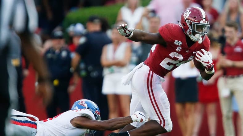 Ole Miss defensive back Jaylon Jones (31) dives to try to make a tackle on Alabama running back Brian Robinson Jr. (24) during the second half of Alabama's 59-31 victory over Ole Miss Saturday, Sept. 28, 2019. [Staff Photo/Gary Cosby Jr.]

Alabama Vs Ole Miss