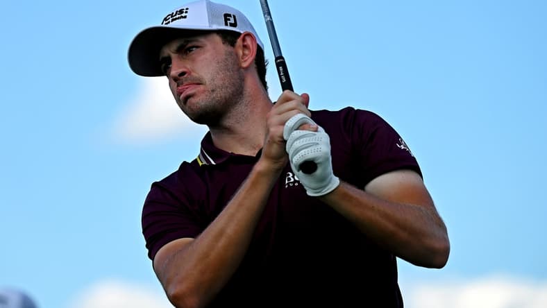 Sep 2, 2021; Atlanta, Georgia, USA; Patrick Cantlay plays his shot from the 16th tee during the first round of the Tour Championship golf tournament. Mandatory Credit: Adam Hagy-USA TODAY Sports