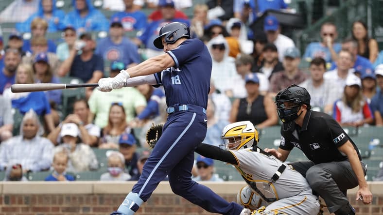Sep 3, 2021; Chicago, Illinois, USA; Chicago Cubs first baseman Frank Schwindel (18) hits an RBI-single against the Pittsburgh Pirates during the second inning at Wrigley Field. Mandatory Credit: Kamil Krzaczynski-USA TODAY Sports