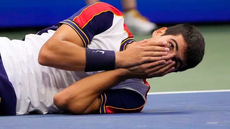 Sep 3, 2021; Flushing, NY, USA; Carlos Alcaraz of Spain reacts after beating Stefanos Tsitsipas of Greece (not pictured) on day five of the 2021 U.S. Open tennis tournament at USTA Billie King National Tennis Center. Mandatory Credit: Robert Deutsch-USA TODAY Sports