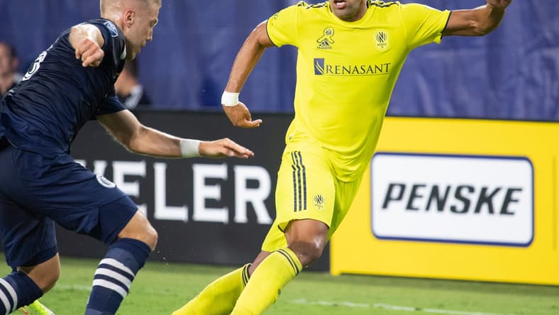 Nashville SC forward Daniel Rios (14) drives past New York City FC defender Anton Tinnerholm (3) during the first half of an MLS game at Nissan Stadium Friday, Sept. 3, 2021 in Nashville, Tenn.
Nas Nashville Sc Nyc Fc 019