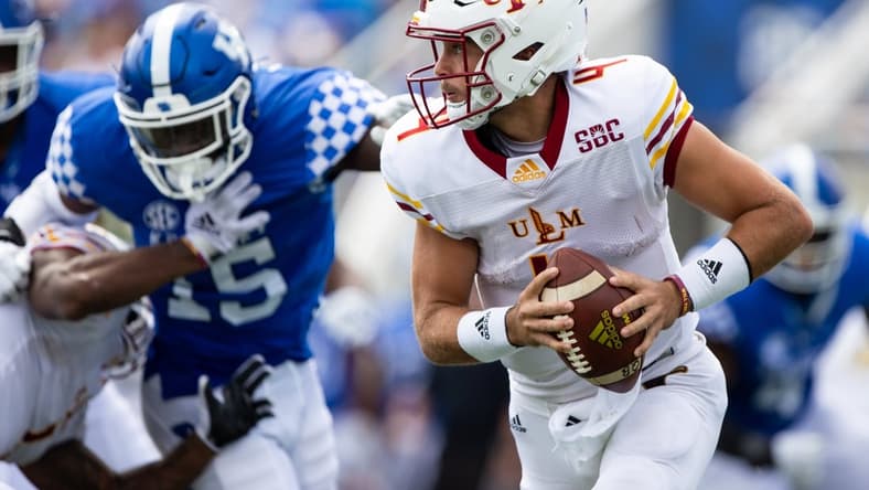 Sep 4, 2021; Lexington, Kentucky, USA; Louisiana Monroe Warhawks quarterback Rhett Rodriguez (4) carries the ball during the second quarter against the Kentucky Wildcats at Kroger Field. Mandatory Credit: Jordan Prather-USA TODAY Sports