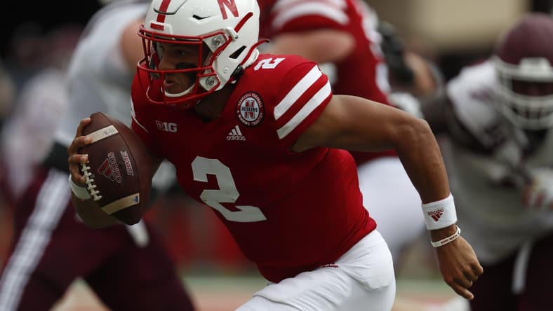 Sep 4, 2021; Lincoln, Nebraska, USA; Nebraska Cornhuskers quarterback Adrian Martinez (2) runs against the Fordham Rams in the first half at Memorial Stadium. Mandatory Credit: Bruce Thorson-USA TODAY Sports