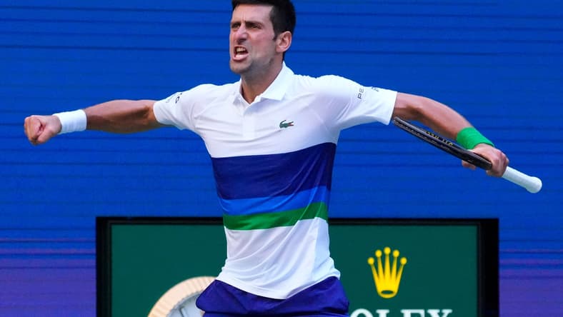 Sep 4, 2021; Flushing, NY, USA; Novak Djokovic of Serbia reacts to the crowd after winning the 3rd set against Kei Nishikori of Japan on day six of the 2021 U.S. Open tennis tournament at USTA Billie Jean King National Tennis Center. Mandatory Credit: Robert Deutsch-USA TODAY Sports