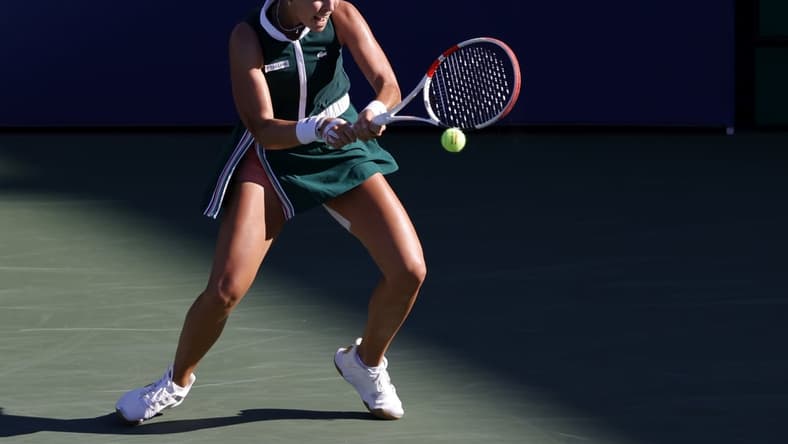 Sep 4, 2021; Flushing, NY, USA; Anett Kontaveit of Estonia hits a backhand against Iga Swiatek of Poland (not pictured) on day six of the 2021 U.S. Open tennis tournament at USTA Billie Jean King National Tennis Center. Mandatory Credit: Geoff Burke-USA TODAY Sports