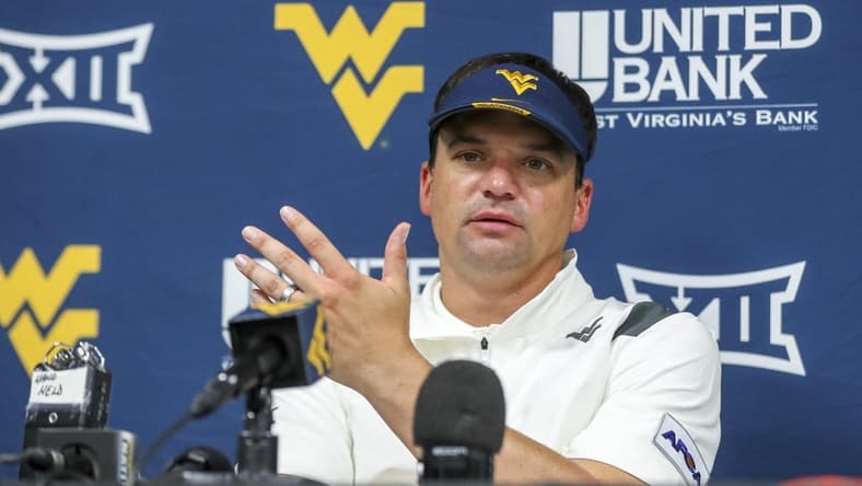 Sep 4, 2021; College Park, Maryland, USA; West Virginia Mountaineers head coach Neal Brown talks to the media after a loss to the Maryland Terrapins at Capital One Field at Maryland Stadium. Mandatory Credit: Ben Queen-USA TODAY Sports