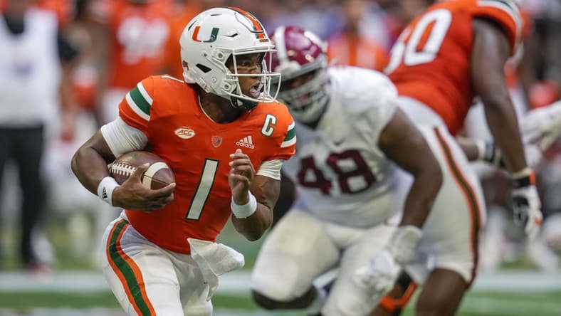 Sep 4, 2021; Atlanta, Georgia, USA; Miami Hurricanes quarterback D'Eriq King (1) runs with the ball against the Alabama Crimson Tide during the second half at Mercedes-Benz Stadium. Mandatory Credit: Dale Zanine-USA TODAY Sports