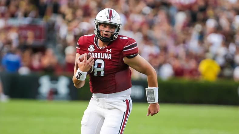 Sep 4, 2021; Columbia, South Carolina, USA; South Carolina Gamecocks quarterback Zeb Noland (8) scrambles against the Eastern Illinois Panthers in the first quarter at Williams-Brice Stadium. Mandatory Credit: Jeff Blake-USA TODAY Sports