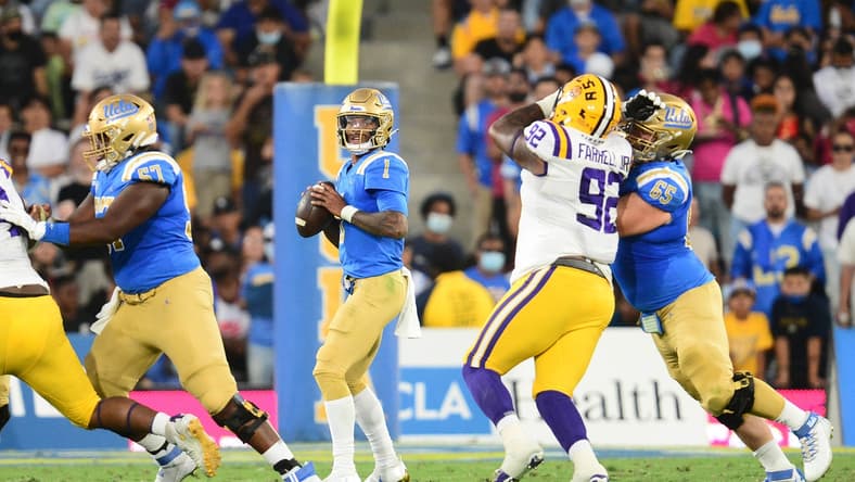 Sep 4, 2021; Pasadena, California, USA; UCLA Bruins quarterback Dorian Thompson-Robinson (1) drops back to pass against the Louisiana State Tigers during the first half the at the Rose Bowl. Mandatory Credit: Gary A. Vasquez-USA TODAY Sports