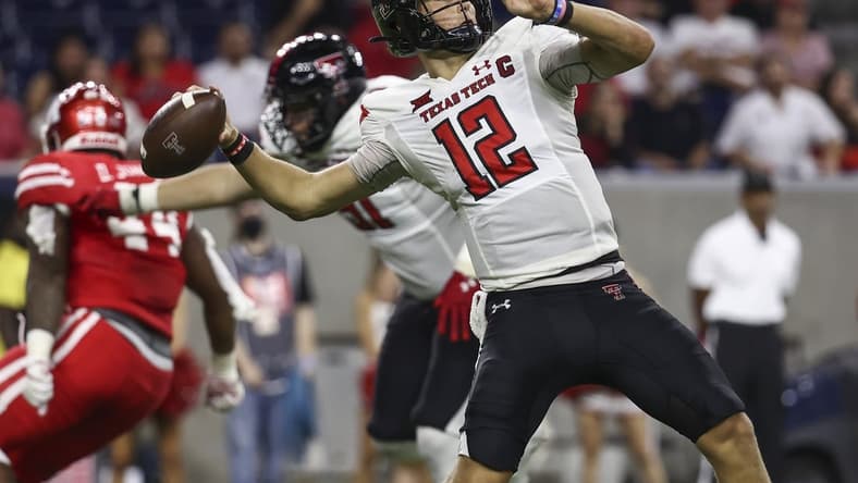 Sep 4, 2021; Houston, Texas, USA; Texas Tech Red Raiders quarterback Tyler Shough (12) attempts a pass during the fourth quarter against the Houston Cougars at NRG Stadium. Mandatory Credit: Troy Taormina-USA TODAY Sports