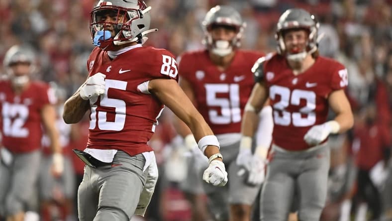 Sep 4, 2021; Pullman, Washington, USA; Washington State Cougars Lincoln Victor (85) celebrates a tackle on special team during a game against the Utah State Aggies in the second half at Gesa Field at Martin Stadium. The Aggies26-23. Mandatory Credit: James Snook-USA TODAY Sports
