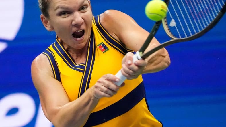 Sep 5, 2021; Flushing, NY, USA;  Simona Halep of Romania hits to Elina Svitolina (not pictured) of the Ukraine on day seven of the 2021 U.S. Open tennis tournament at USTA Billie Jean King National Tennis Center. Mandatory Credit: Robert Deutsch-USA TODAY Sports