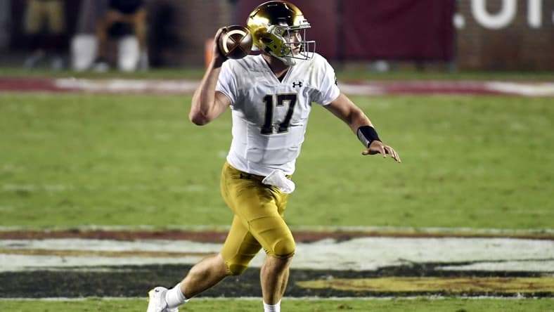 Sep 5, 2021; Tallahassee, Florida, USA; Notre Dame Fighting Irish quarterback Jack Coan (17) runs with the ball during the second quarter against the Florida State Seminoles at Doak S. Campbell Stadium. Mandatory Credit: Melina Myers-USA TODAY Sports