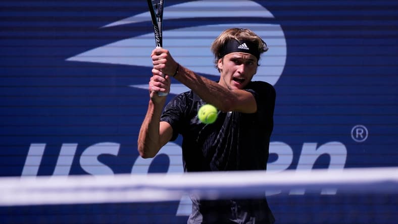 Sep 6, 2021; Flushing, NY, USA;  Alexander Zverev of Germany hits to Jannik Sinner of Italy on day eight of the 2021 U.S. Open tennis tournament at USTA Billie Jean King National Tennis Center. Mandatory Credit: Robert Deutsch-USA TODAY Sports