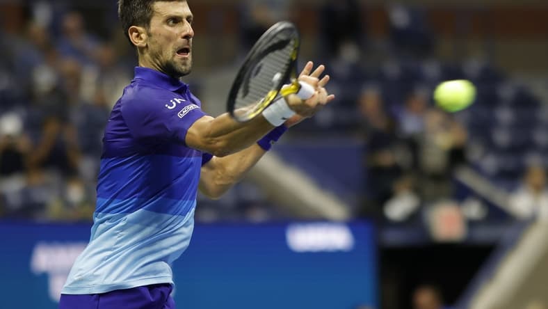 Sep 8, 2021; Flushing, NY, USA; Novak Djokovic of Serbia hits a forehand against Matteo Berrettini of Italy (not pictured) on day ten of the 2021 U.S. Open tennis tournament at USTA Billie Jean King National Tennis Center. Mandatory Credit: Geoff Burke-USA TODAY Sports