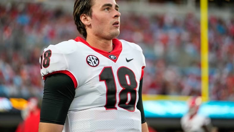 Sep 4, 2021; Charlotte, North Carolina, USA; Georgia Bulldogs quarterback JT Daniels (18) during the first quarter against the Clemson Tigers at Bank of America Stadium. Mandatory Credit: Jim Dedmon-USA TODAY Sports