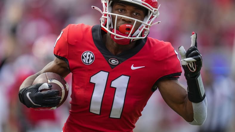 Sep 11, 2021; Athens, Georgia, USA; Georgia Bulldogs wide receiver Arian Smith (11) reacts as he scores a touchdown after catching a pass against the UAB Blazers during the first half at Sanford Stadium. Mandatory Credit: Dale Zanine-USA TODAY Sports
