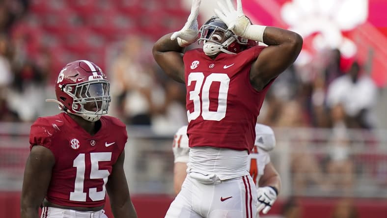 Sep 11, 2021; Tuscaloosa, Alabama, USA; Alabama Crimson Tide linebacker King Mwikuta (30) reacts after a play against the Mercer Bears at Bryant-Denny Stadium. Mandatory Credit: Marvin Gentry-USA TODAY Sports