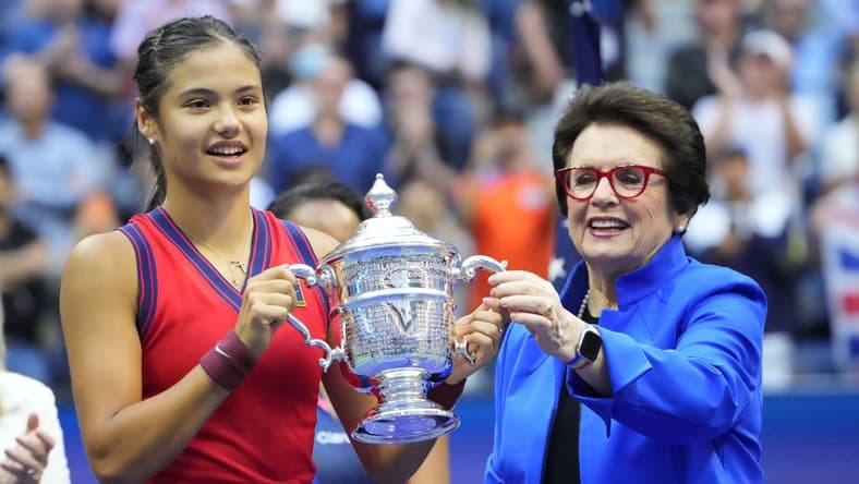 Sep 11, 2021; Flushing, NY, USA; Emma Raducanu of Great Britain (L) is presented the championship trophy by Billie Jean King (R) after her match against Leylah Fernandez of Canada (not pictured) in the women's singles final on day thirteen of the 2021 U.S. Open tennis tournament at USTA Billie Jean King National Tennis Center. Mandatory Credit: Robert Deutsch-USA TODAY Sports