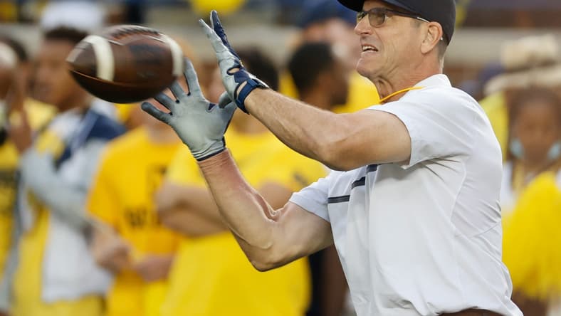 Sep 11, 2021; Ann Arbor, Michigan, USA; Michigan Wolverines head coach Jim Harbaugh during warm ups against the Washington Huskies at Michigan Stadium. Mandatory Credit: Rick Osentoski-USA TODAY Sports