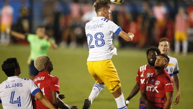 Sep 11, 2021; Frisco, Texas, USA; San Jose Earthquakes forward Benji Kikanovic (28) heads the ball in the second half against FC Dallas at Toyota Stadium. Mandatory Credit: Tim Heitman-USA TODAY Sports
