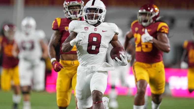 Sep 11, 2021; Los Angeles, California, USA; Stanford Cardinal running back Nathaniel Peat (8) scores on an 87-yard touchdown run against the Southern California Trojans in the first quarter at United Airlines Field at Los Angeles Memorial Coliseum. Mandatory Credit: Kirby Lee-USA TODAY Sports