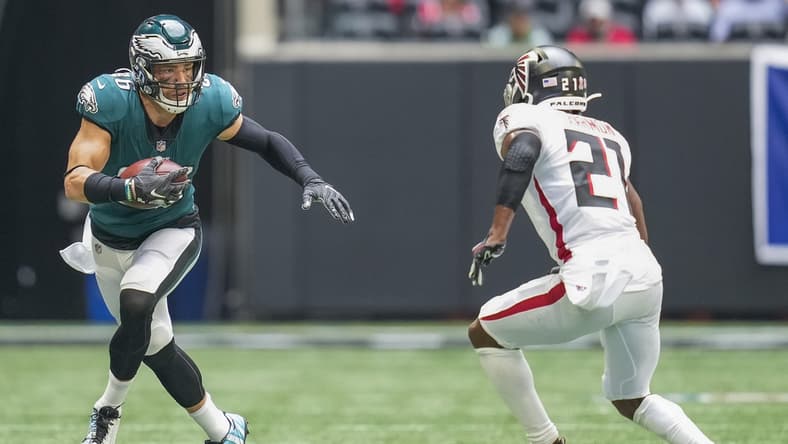 Sep 12, 2021; Atlanta, Georgia, USA; Philadelphia Eagles tight end Zach Ertz (86) runs against Atlanta Falcons safety Duron Harmon (21) at Mercedes-Benz Stadium. Mandatory Credit: Dale Zanine-USA TODAY Sports