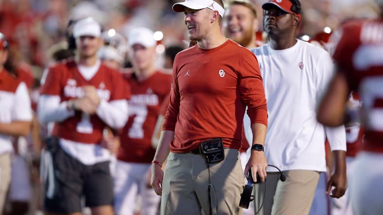 OU coach Lincoln Riley smiles after a touchdown Saturday night.
jump
