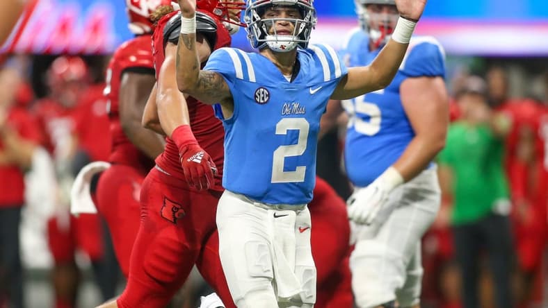 Sep 6, 2021; Atlanta, Georgia, USA; Mississippi Rebels quarterback Matt Corral (2) shows emotion against the Louisville Cardinals in the second half at Mercedes-Benz Stadium. Mandatory Credit: Brett Davis-USA TODAY Sports