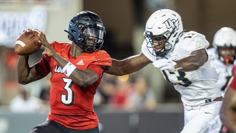 UofL quarterback Malik Cunningham is sacked during the first half Friday evening as the Louisville Cardinals took on the University of Central Florida at Cardinal Stadium. The Cardinals led 21-14 at halftime. Sept. 17, 2021

As 4148 Uofl Ucf 1sthalf351