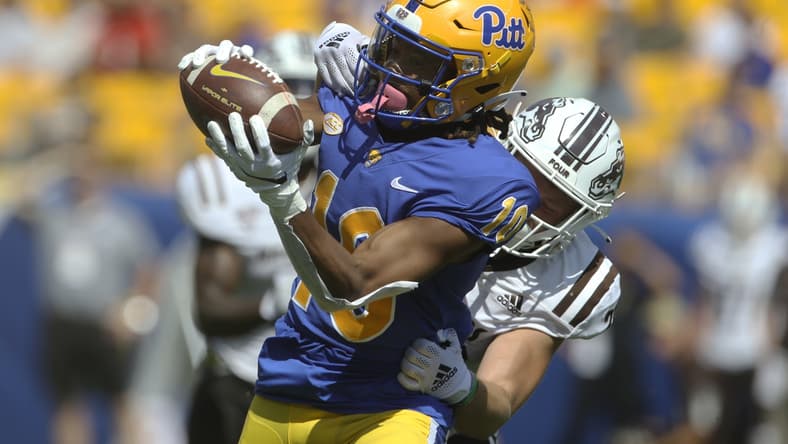 Sep 18, 2021; Pittsburgh, Pennsylvania, USA; Pittsburgh Panthers wide receiver Jaylon Barden (10) makes a catch against Western Michigan Broncos safety Ryan Kilburg (rear) during the second quarter at Heinz Field. Mandatory Credit: Charles LeClaire-USA TODAY Sports