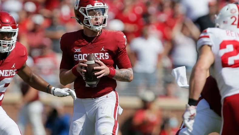 Oklahoma's Spencer Rattler (7) drops back to pass during a college football game between the University of Oklahoma Sooners (OU) and the Nebraska Cornhuskers at Gaylord Family-Oklahoma Memorial Stadium in Norman, Okla., Saturday, Sept. 18, 2021. Oklahoma won 23-16.

Lx15470