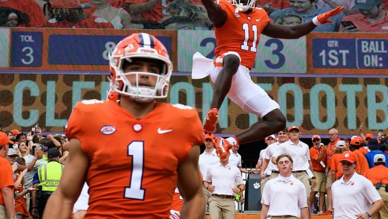 Clemson wide receiver Ajou Ajou (11) leaps into the air before their game against Georgia Tech at Memorial Stadium Saturday, Sept. 18, 2021.

Jm Clemson 091821 009