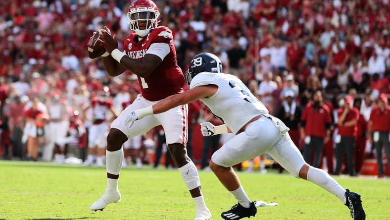 Sep 18, 2021; Fayetteville, Arkansas, USA; Arkansas Razorbacks quarterback KJ Jefferson (1) passes in the second quarter as Georgia Southern Eagles linebacker Reid Dedman (39) defends at Donald W. Reynolds Razorback Stadium. Mandatory Credit: Nelson Chenault-USA TODAY Sports