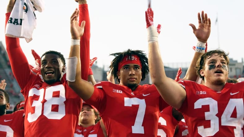 Ohio State Buckeyes defensive back Cameron Kittle (38), Ohio State Buckeyes quarterback C.J. Stroud (7) and Ohio State Buckeyes tight end Mitch Rossi (34) sing "Carmen Ohio" following Saturday's NCAA Division I football game against the Tulsa Golden Hurricanes at Ohio Stadium in Columbus on September 18, 2021. Ohio State won the game 41-20.

Osu21tlsa Bjp 1218