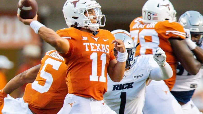 Sep 18, 2021; Austin, Texas, USA; Texas Longhorns quarterback Casey Thompson (11) passes the ball against the Rice Owls during the first quarter at Darrell K Royal-Texas Memorial Stadium. Mandatory Credit: John Gutierrez-USA TODAY Sports