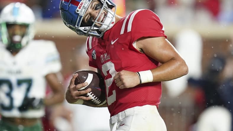 Sep 18, 2021; Oxford, Mississippi, USA; Mississippi Rebels quarterback Matt Corral (2) scores against Tulane Green Wave at Vaught-Hemingway Stadium. Mandatory Credit: Marvin Gentry-USA TODAY Sports
