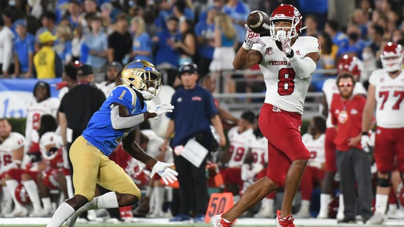 Sep 18, 2021; Pasadena, California, USA; Fresno State Bulldogs wide receiver Ty Jones (8) makes a catch against UCLA Bruins defensive back Jay Shaw (1) in the second quarter at Rose Bowl. Mandatory Credit: Richard Mackson-USA TODAY Sports