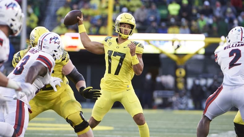 Sep 18, 2021; Eugene, Oregon, USA; Oregon Ducks quarterback Ty Thompson (17) throws a pass during the second half against the Stony Brook Seawolves at Autzen Stadium. The Ducks won 48-7. Mandatory Credit: Troy Wayrynen-USA TODAY Sports
