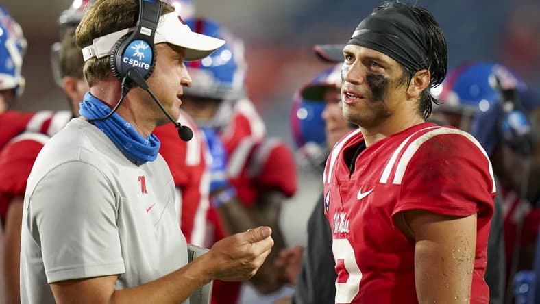 Sep 18, 2021; Oxford, Mississippi, USA; Mississippi Rebels quarterback Matt Corral (2) talks with Mississippi Rebels head coach Lane Kiffen at Vaught-Hemingway Stadium. Mandatory Credit: Marvin Gentry-USA TODAY Sports