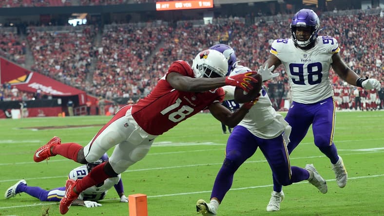 Sep 19, 2021; Glendale, Arizona, USA; Arizona Cardinals wide receiver A.J. Green (18) dives for a touchdown against the Minnesota Vikings during the second half at State Farm Stadium. Mandatory Credit: Joe Camporeale-USA TODAY Sports