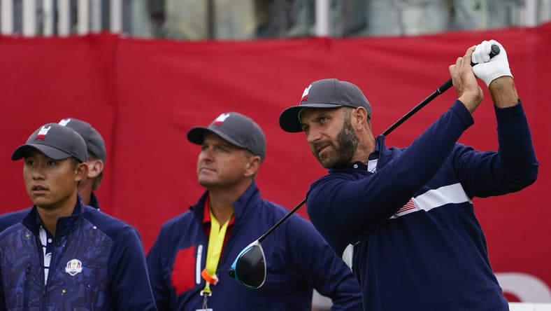 Sep 21, 2021; Kohler, Wisconsin, USA; Dustin Johnson watches his tee shot on the 1st hole during practice rounds for the 43rd Ryder Cup golf competition at Whistling Straits. Mandatory Credit: Michael Madrid-USA TODAY Sports